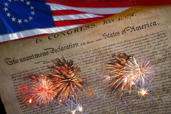 Declaration of Independence parchment with fireworks and Betsy Ross flag — marking the municipal clerk history behind America 250